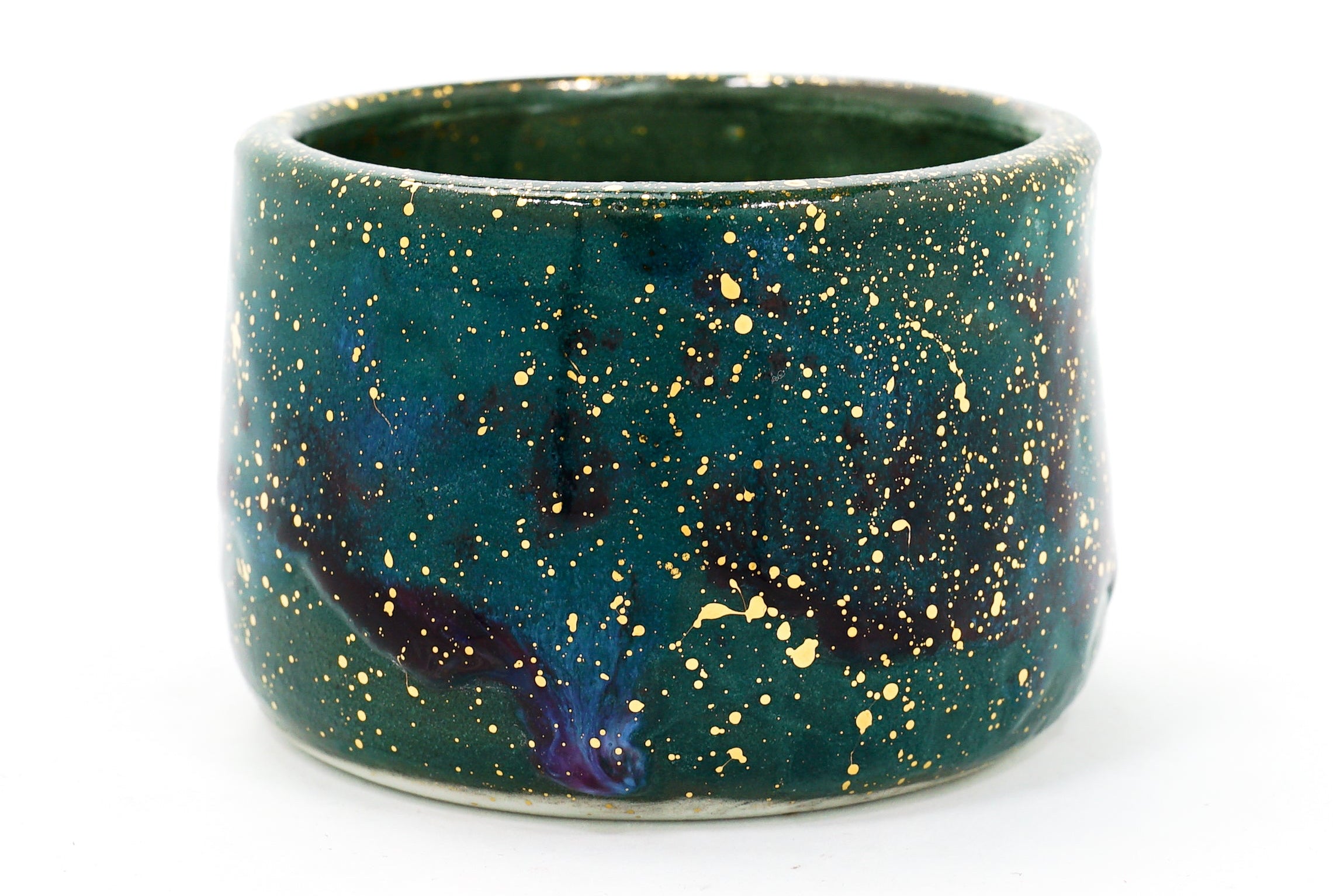 Ceramic mug with a galaxy design on a white background